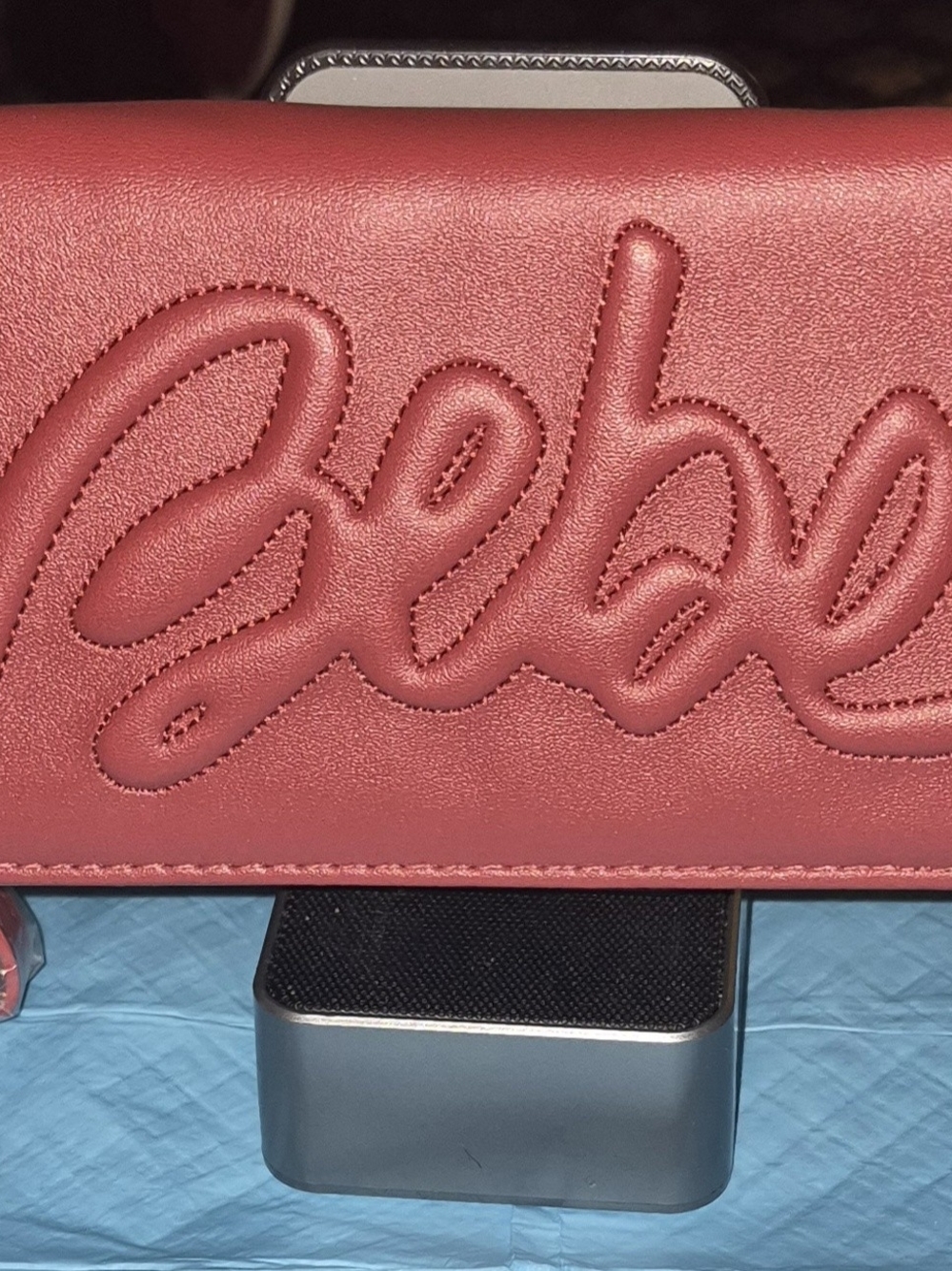 bebe Red  Embossed Logo Clutch